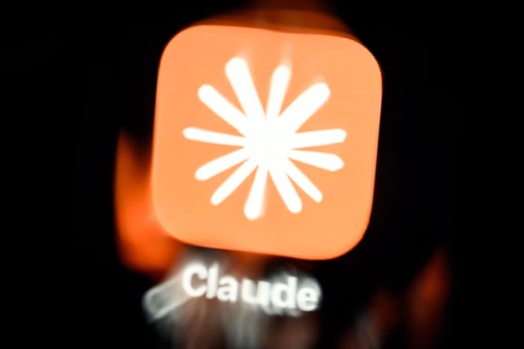 Claude's app icon displayed on a phone screen, the image TechCrunch ran alongside its coverage of Anthropic's S-1 filing